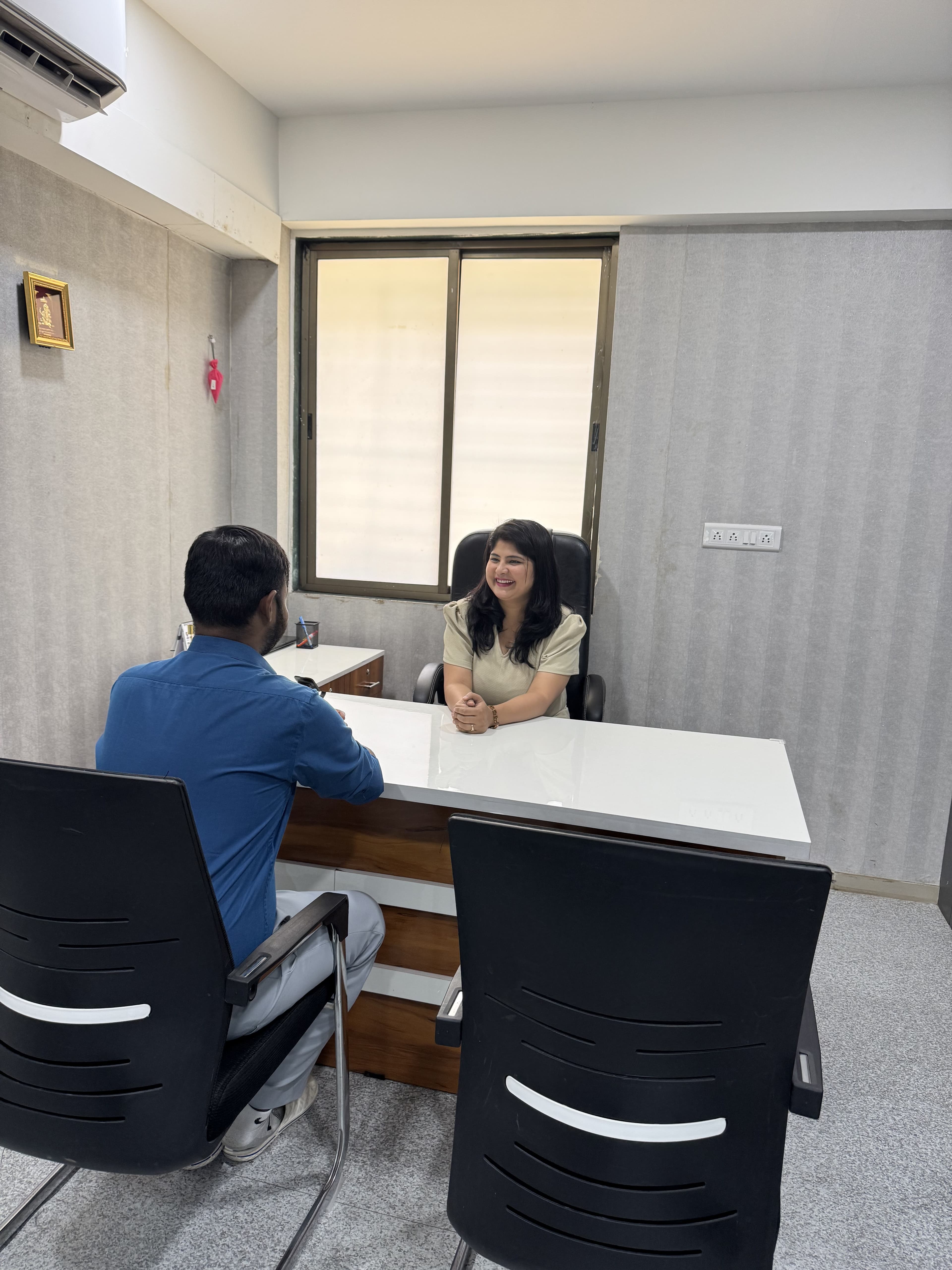 Dr. Niharika in consultation with a patient at Neurokine