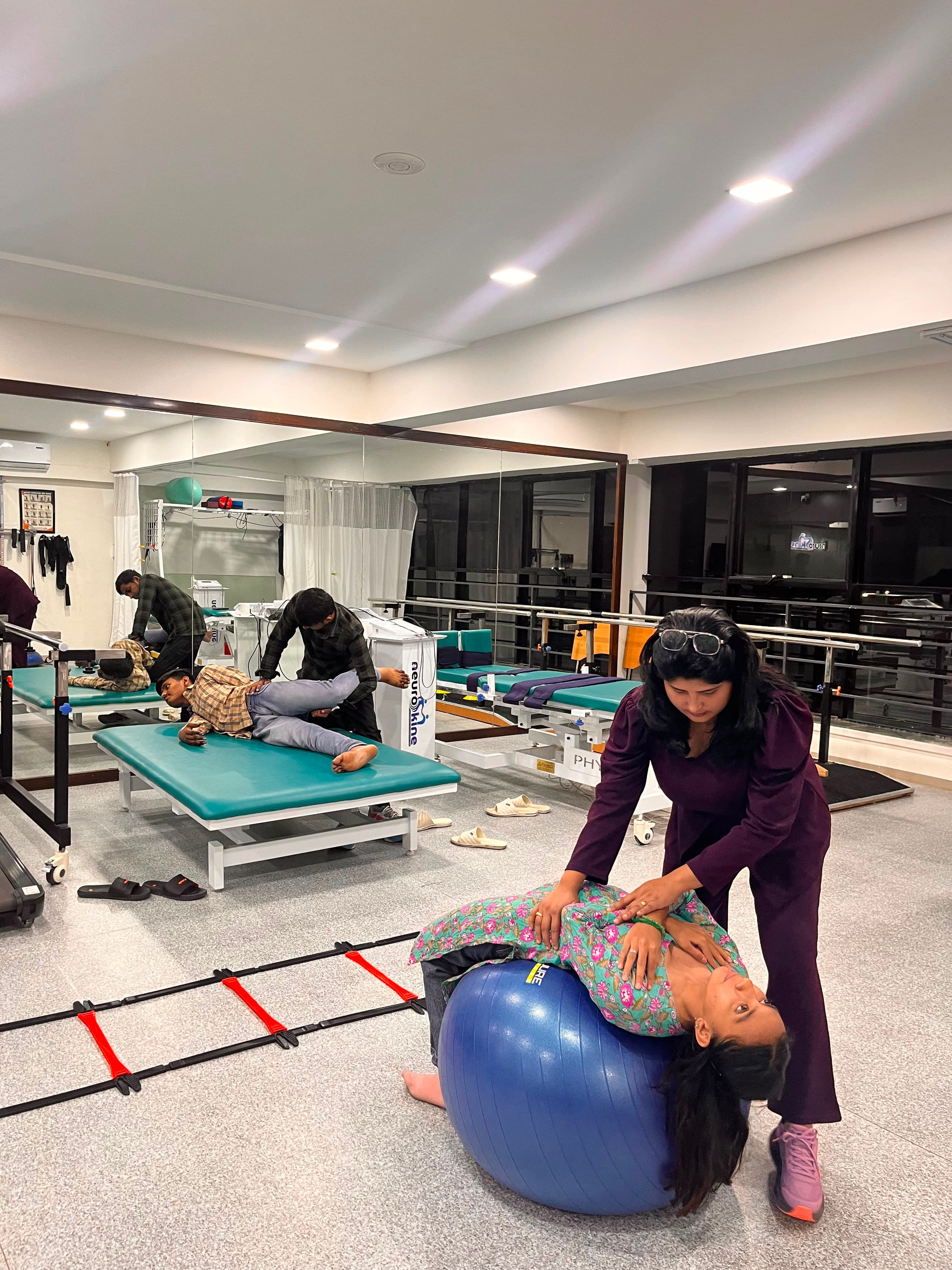 Patient receiving physiotherapy support in a modern clinic